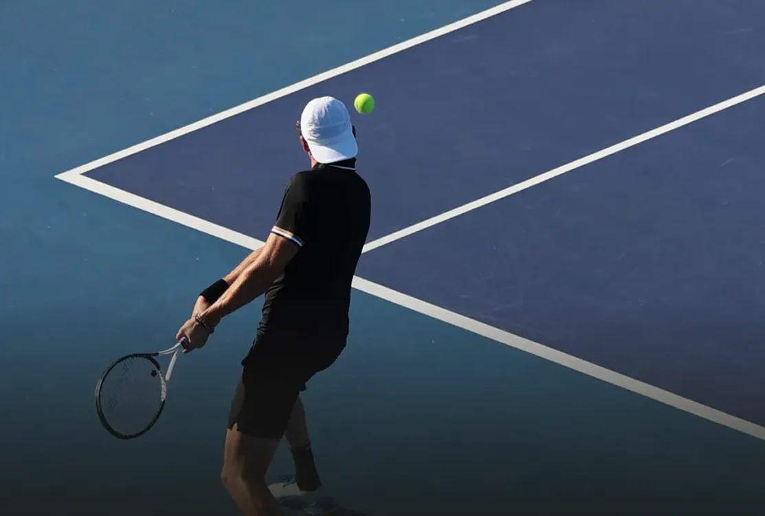 Tennis ball machines and equipment for tennis training