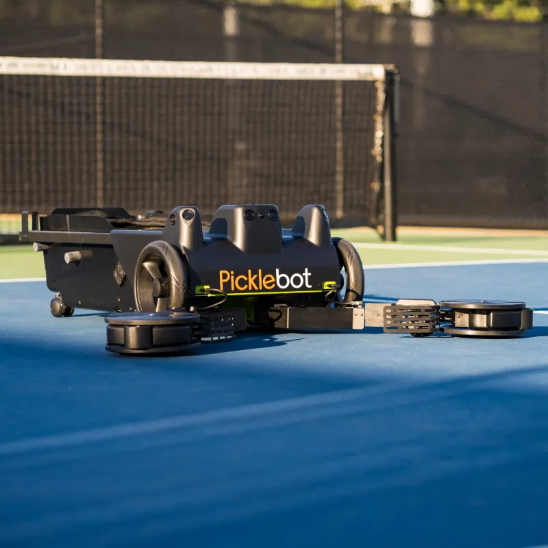 Tennibot Rover collecting pickleballs on court