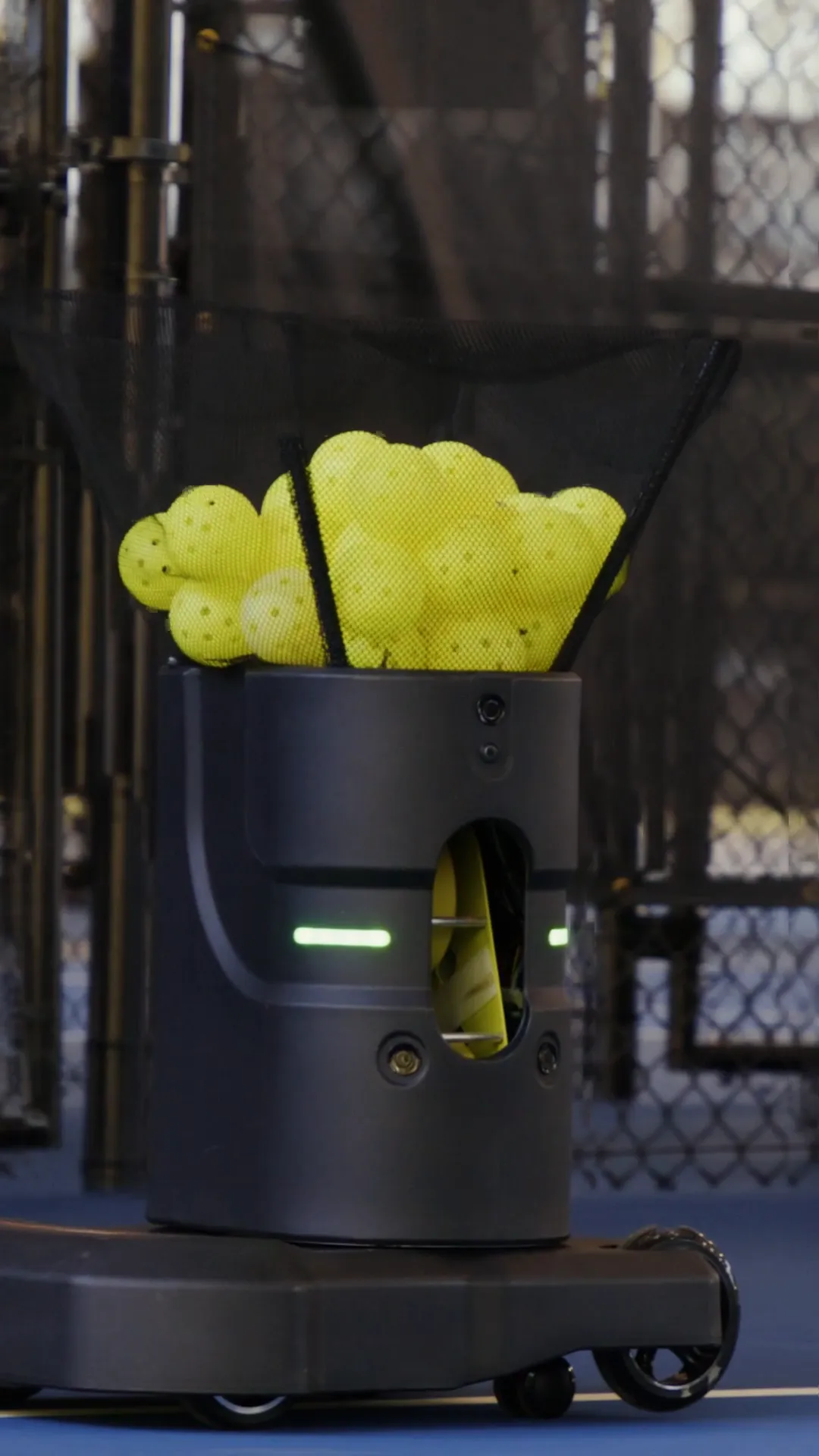 Partner V2 loaded with pickleballs on court